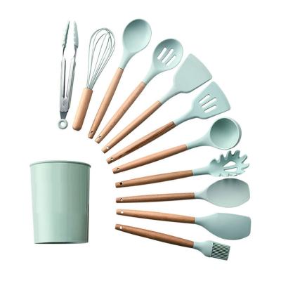 China Viable Hot Selling Wooden Handle Silicone Kitchenware 12 Pieces Set Cook Spoon Shovel Stick Pot Shovel Kitchenware Non for sale