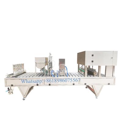 China Wuhan Yijianuo Food Customized Automatic Jelly PP Cup Filling Sealing Machine for Jelly Puddings, Rice Pudding for sale