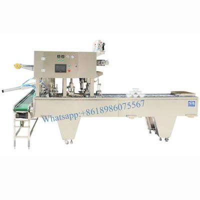 China Automatic Food Rice Congee Bowl Vacuum Filling Sealing Machine for sale