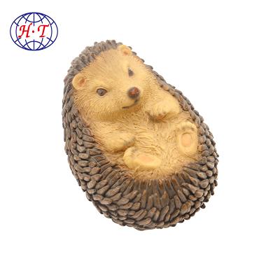 China Europe Customized Small Garden Resin Animals , Polyresin Realistic Adorable Hedgehog Statues for sale