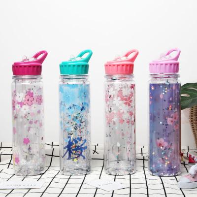 China BPA FREE Sustainable Sakura Double Wall Plastic Mug With Sippy Filter For New Year Gift 20oz for sale