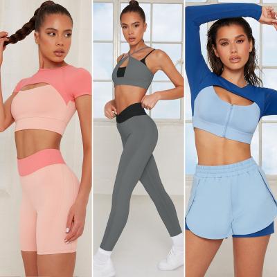 China New Breathable Yoga Fitness Set Contrast Color Stitching Yoga Suit Long Sleeve Quick Dry Sportswear 2 Piece Set Bra Shorts Women Clothing for sale