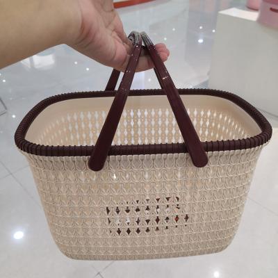 China Sustainable Cheap Portable Plastic Storage Basket Sundries Dirty Storage Basket Rattan for sale