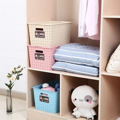 China Sustainable Home Rectangular Plastic Sundries Rattan Storage Basket With Lids for sale