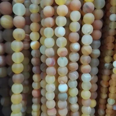 China orange striped onyx round beads for sale