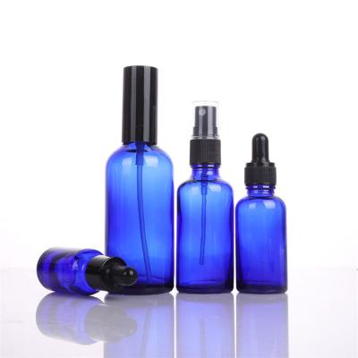 China New Products Smoked Essential Oil Blue 15ml Cosmetic Glass Bottle Beauty Liquid Bottle for sale