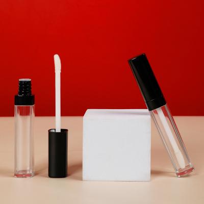 China Black Lid Plastic Transparent Logo Lip Gloss Magic Wand Cosmetic Professional Custom Tubes for sale