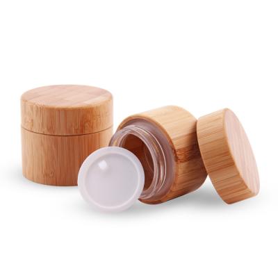 China 30g 50g Cosmetic Empty Cream Packaging Jar Bamboo Lid Frosted Glass for sale