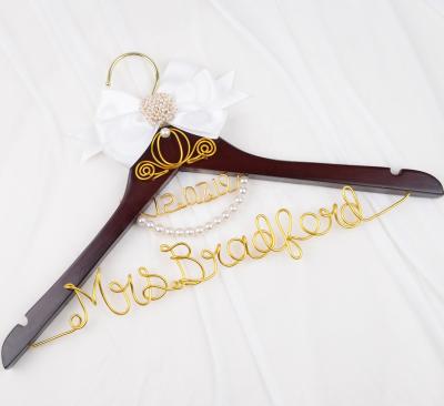 China Custom bridal dress hanger personalized with name, wedding date and bride symbols made of foil, decorated with ribbon bow for sale