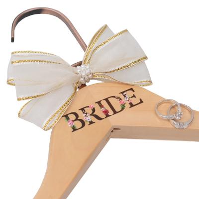 China Custom Wooden Wedding Dress Hanger Printed with Colorful Bride, Groom, Groomsmen and Bridesmaids Titles UV001 for sale