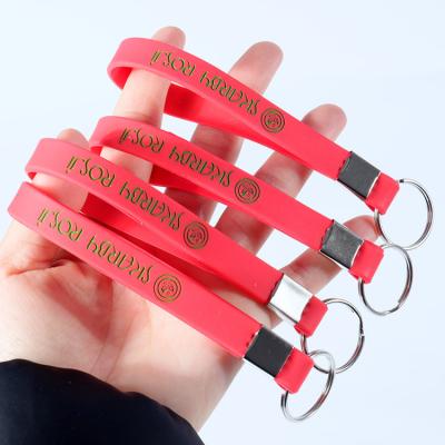 China Non-Toxic Custom Personalized Silicone Hand Band Bracelets / Silicone Key Chain Bracelet for sale