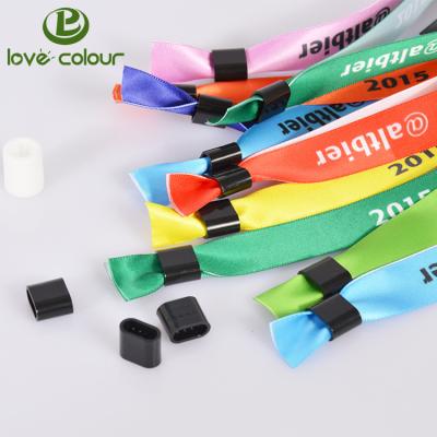 China Advertising Cheap Custom Colorful Satin Festival Wristband With Plastic Clips for sale