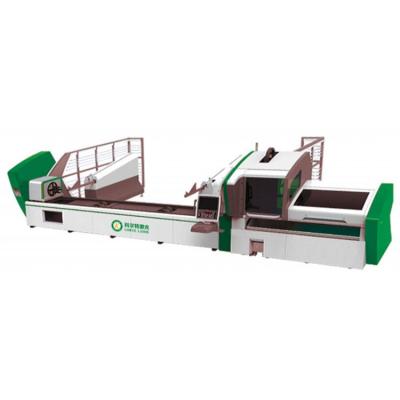 中国 CNC water-cooled multifunctional tube metal automatic loading and unloading of fiber laser pipe cutting machine 販売のため