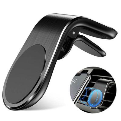 China Metal Car Phone Holder Air Vent Dashboard Clip Magnet Car Mobile Phone Holder Mount 360 Magnetic Universal Adjustable for sale