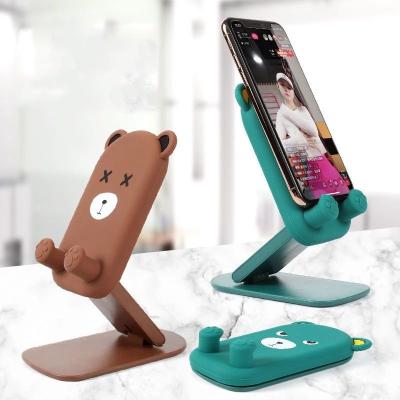 China Hot Selling Adjustable Cute Cartoon Silicone Bear Mobile Phone Stand Foldable Desktop Stand Holder for sale