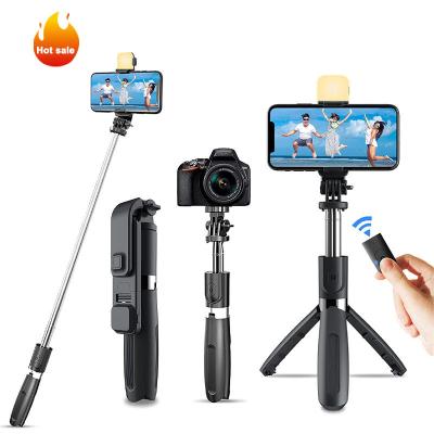 China 4-6.6 inches most IOS & Android Device L02s Selfie Stick Camera 360 Degree Rotation Radio Selfie Stick Tripod Holder Fill Light Smart BT Tripod Selfie Stick Camera for sale