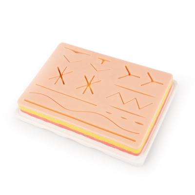 China Silicone Material Surgical Use Suture Silicone Training Training Pad With Plastic Backing for sale