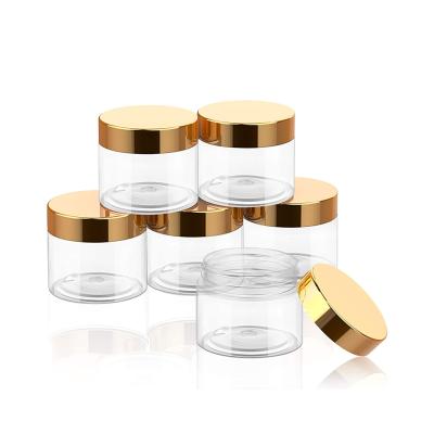 China Portable Round 2oz Empty Refillable Clear Leak Proof Plastic Container Cosmetic Jar With Lid for sale