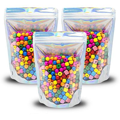 China Recycled Materials Wholesale Resealable Zipper Holographic Foil Lining 3 Sides Sealed Candy Food Bag for sale