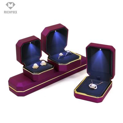 China Fashion Hot Selling Luxury Jewelery Packaging Jewelry Box Sets PU Leather Bracelet Ring Earrings Jewelry Box With Led Light for sale