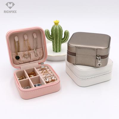 China 2021 Hot Sale Pink Ring Earring Packaging Pu Leather Jewelry Case Multifunctional Custom Jewelry Storage Box With Logo for sale