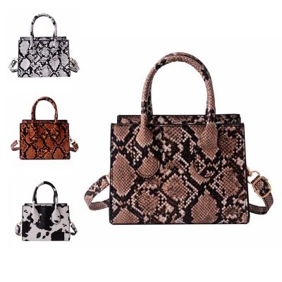 China PORTABLE Snake Print Ladies Shoulder Cross - Body Purses and Handbags 2021 Women Mini Hand Bags Serpentine Luxury Handbags For Women for sale