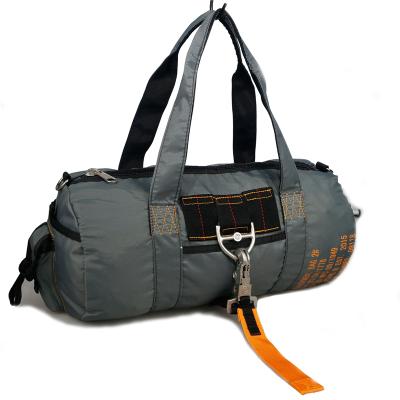 China Outdoor Tactical Water Resistant Duffle Parachute Duffle Gym Large Capacity Hand Travel Luggage Bag for sale