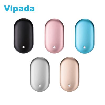 China 5000mAh Hand Portable Warmer Mini Powerbank Colorful Cute Portable Charger Power Bank Rechargeable Power Bank for sale