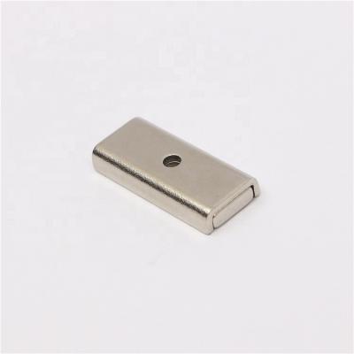 China Counter Magnet Industrial Supplier L30mm China Strong Rectangular Bored Neodymium Pot Magnet for sale