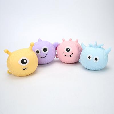 China Toy Factory Sale Smiling TPR Soft Glowing Children's Toy Ball Smile Big Eyes Squeeze Ball Squeeze Monsters Toys for sale