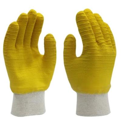 China Yellow Cotton Jersey Gloves Wavy Rubber Full Latex Covered Gloves for sale