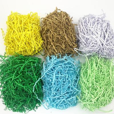 China 2021 Hot Sales Deco Amazon Fold Cut Shredded Paper Gift Basket Filler Paper Fold Sparta Filler Easter Grass Party Goods for sale