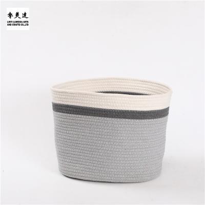 China Custom Natural Woven Basket Stocked Cotton Rope Stake Basket New Design Large Cotton Rope Storage Basket for sale