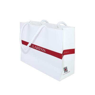 China Custom Materials Small Gift Shopping Materials Factory Logo Print Clothing Jewelry Luxury Recycled Paper Bag With Ribbon Handles for sale