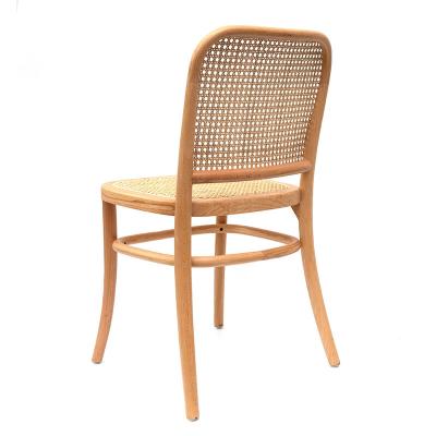 China Vintage Rattan Convertible Light Luxury Single Rattan Dining Chair Comfortable Artist Design Retro Tea Room Chair With Coffee Te koop