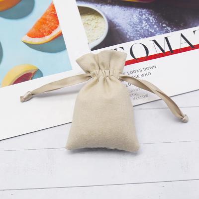 China Luxury Package Microfiber Drawstring Printed Brown Jewelry Pouch Small Jewelry Pouch China Custom Jewelry Bags Mini for sale