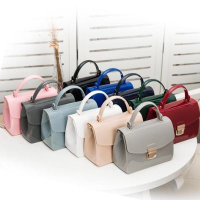 China Fashion Wholesale Fashion PVC Jelly Bag Women Tote Bag And Clip PVC Sling Bag Candy Color Handbags for sale