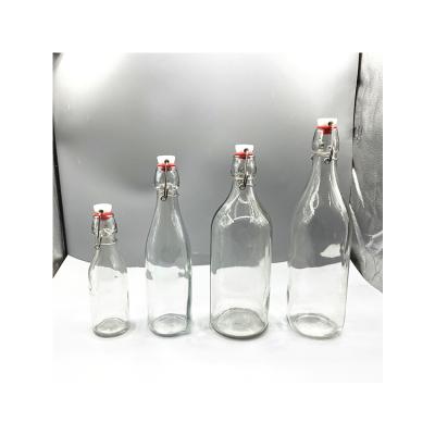 China Original Factory Stocked Round 350ml 500ml Transparent Olive Glass Oil Bottle for sale