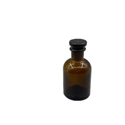 China Hot Sale Lead Free Glass Lab Chemical Brown Mouth Small White Glass Reagent Bottle for sale