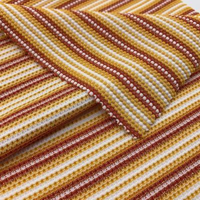 China Customized Viable Hot Selling Gold Color Yarn Mini Jacquard For Swimwear Fabric for sale