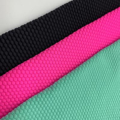 China Hot selling viable cotton seersucker knit honeycomb fabric for sport use for swimwear fabric for sale