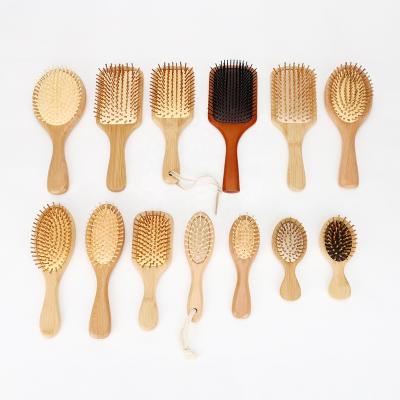 China Eco-Friendly Massage Function Massager Anti Detangle Comb Hairbrush Personal Wooden Wide Tooth Comb Antistatic Detangle Paddle Hairbrush for sale