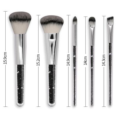 China Angular Blush Crystal Makeup Brushes With Clear Acrylic Holder 5pcs Cosmetic Tool Set for sale