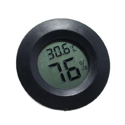 China Plastic Black Thermohygrometer Detector Tester Mini Round LCD Display Digital Thermometer Refrigerator Hygrometer Home Measuring Tool for sale