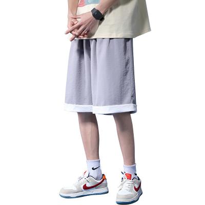 China Anti-wrinkle Fashion Ins Men's Casual Shorts Loose Comfortable Street Sports Tend Five Pants Solid Color Gaiters For Men for sale