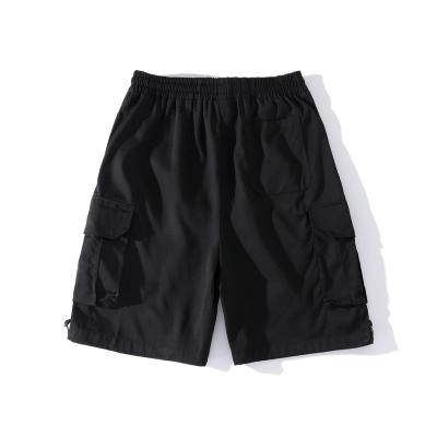 China Anti-wrinkle popular empty logo printing pure street casual loose cargo summer puff color man shorts for sale