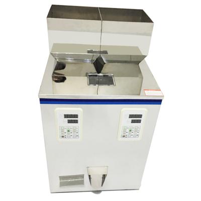 China Two Heads 100g Chemical Economic Powder Granule Weighing Filling Machine With Vibration Switch for sale