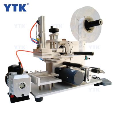 China YTK-60 semi-automatic tabletop flat flat surface food bag labeling printing machine for sale