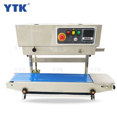 China YTK-FR900V Automatic Vertical Continuous Aluminum Food Film Sealing Machine For Plastic Bags for sale