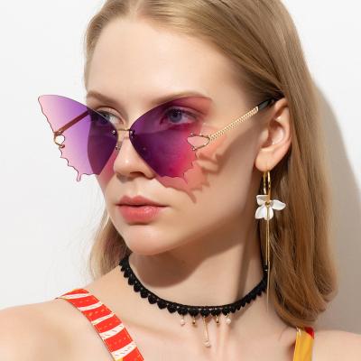 China 2020 Fashion Sunglasses Eyewear Trendy Gradient Lens Butterfly Shape Fashion Women Rimless Sunglasses for sale